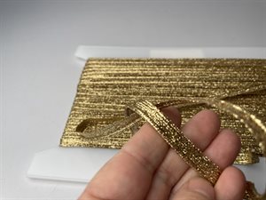 Tittekant - guld med glimmer